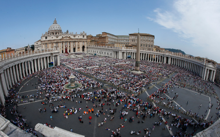 Pope Francis celebrates Mass marking the feast of Pentecost in St. Peter's Square at the Vatican June 4. In attendance were thousands of people celebrating the 50th anniversary of the Catholic charismatic renewal. (CNS/Paul Haring)