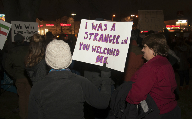 People attend a Feb. 1 vigil sponsored by the Tennessee Immigrant and Refugee Rights Coalition in Nashville in response to President Donald Trump's Jan. 27 executive order suspending the entry of refugees into the United States for 120 days. (CNS photo/Theresa Laurence, Tennessee Register)