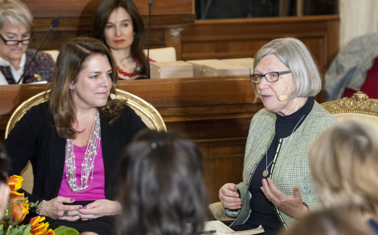 Kerry Alys Robinson, left, and Social Service Sr. Simone Campbell speak during the Voices of Faith gathering March 8 at the Vatican. (CNS photo/Massimiliano Migliorato, Catholic Press Photo)