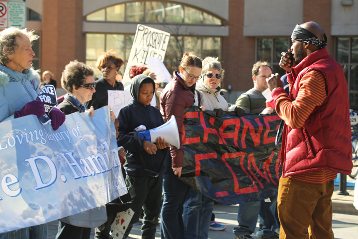 Nate Hamilon, brother of Dontre Hamilton, an unarmed black man killed by police in 2014, addresses the Rally for Justice at Red Arrow Park. (Deb Winarski)