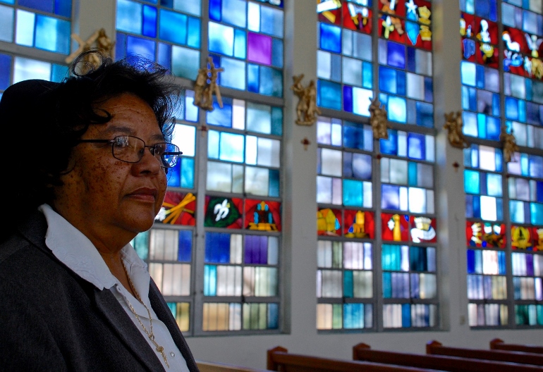 Sr. Mary Greta Jupiter, leader of the Sisters of the Holy Family in New Orleans, in the chapel at the order's motherhouse, which had 5 feet of water on the first floor during Hurricane Katrina and wind damage on the second floor. (GSR photo/Dan Stockman)