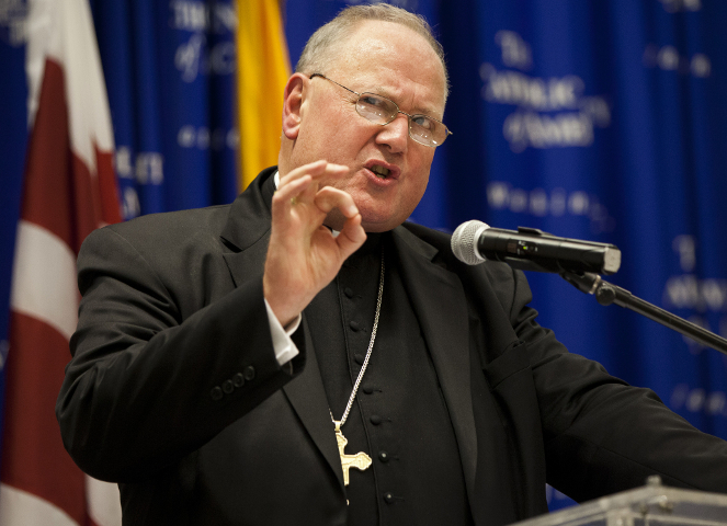 New York Cardinal Timothy Dolan, president of the U.S. Conference of Catholic Bishops, addresses a symposium on international religious freedom at The Catholic University of America in Washington Sept. 12. (CNS photo/Nancy Phelan Wiechec)