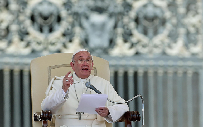 Pope Francis speaks during his weekly audience Wednesday in St. Peter's Square at the Vatican. (CNS/EPA/Alessandro Di Meo)