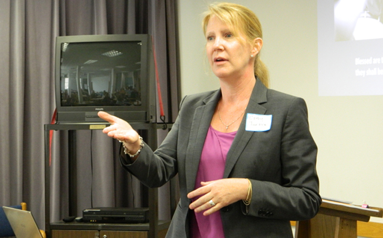 Catherine Jarboe speaks at a Catholic Mobilizing Network presentation. (The Record/Marnie McAllister) 