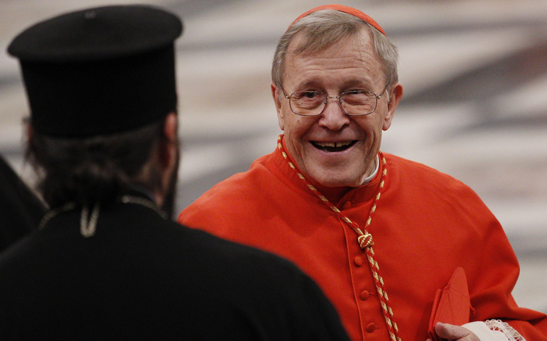 Cardinal Walter Kasper greets clergy as he arrives for Pope Francis' ecumenical vespers Jan. 25 at the Basilica of St. Paul Outside the Walls in Rome. (CNS/Paul Haring)