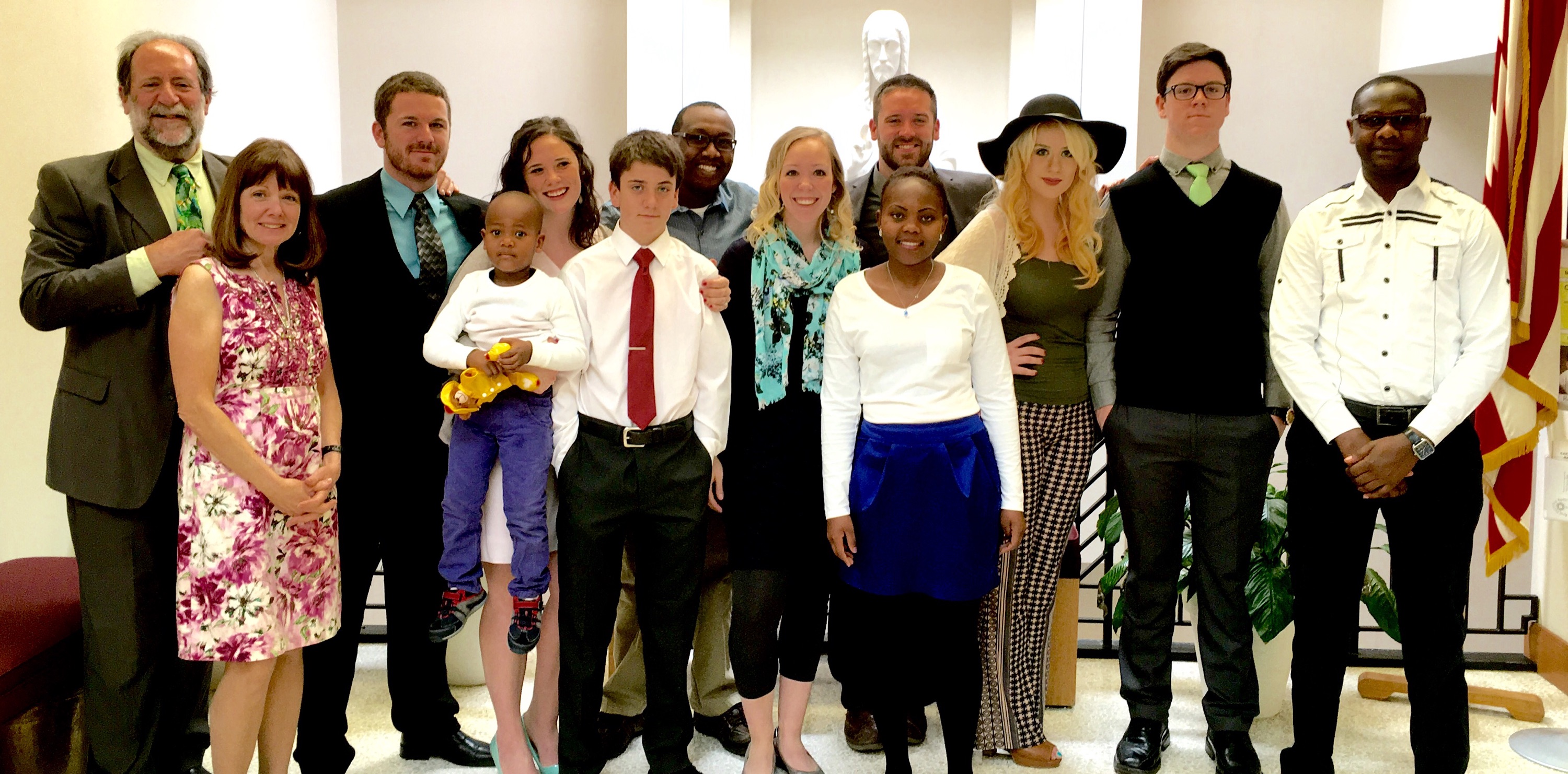  The Dennis and Rachael Gichana Family from Kenya pose with the Mark and Patti Armstrong family at Cathedral of the Holy Spirit Parish in Bismarck, N.D. (Photo courtesy Dennis Gichana) 