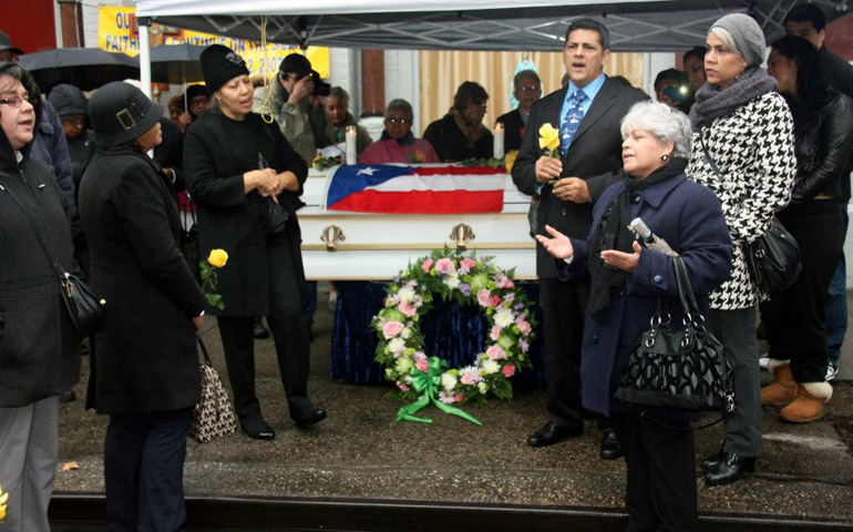 Mourners at Carmen Villegas' funeral on the sidewalk outside of Our Lady Queen of Angels in East Harlem, N.Y. (Marina Ortiz, East Harlem Preservation Inc. http://www.eastharlempreservation.org/)