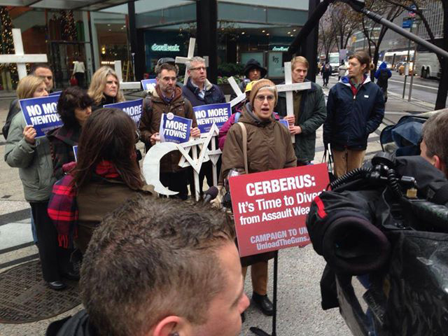 Rosemarie Pace speaks at a Campaign to Unload vigil