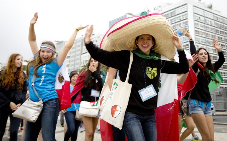 Mexican pilgrims attend World Youth Day on July 23, 2013, in Rio de Janeiro. In a message for this year's local celebrations of World Youth Day, Pope Francis pope said the church wants to help youth find true, lifelong love. (CNS/Tyler Orsburn)