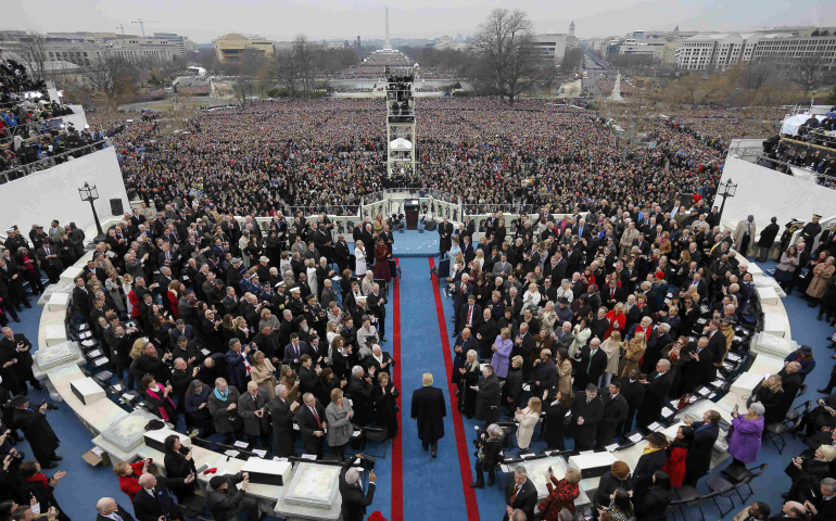 U.S. President-elect Donald Trump is applauded as he arrives for his Jan. 20 swearing-in as the country's 45th president at the U.S. Capitol in Washington Jan. 20. (CNS photo/Rick Wilking, Reuters) 