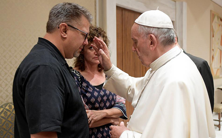 Pope Francis blesses the parents of American university student Beau Solomon during a private meeting at the Vatican July 6, 2016. (Photo courtesy of L'Osservatore Romano/Handout via Reuters)