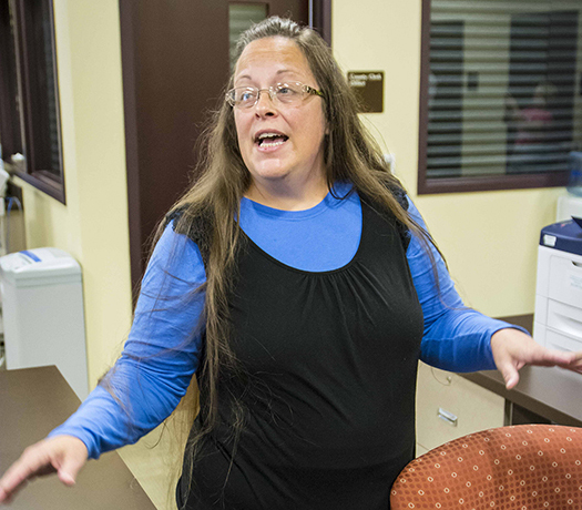 Rowan County, Ky., Clerk Kim Davis argues with David Moore and David Ermold, after they were denied a marriage license at the Rowan County Courthouse in Morehead on Sept. 1, 2015. (USA Today/The Courier-Journal, photo by Tim Webb)