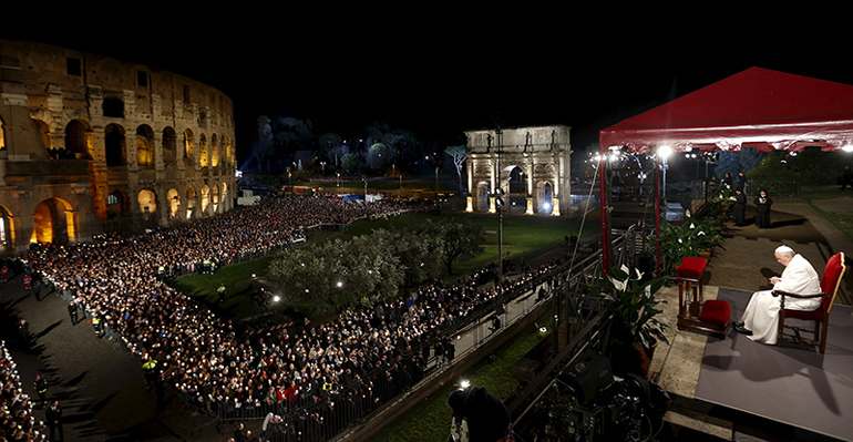 Pope Francis leads the “Via Crucis” (Way of the Cross) procession, which commemorates the crucifixion of Jesus Christ, at the Colosseum in Rome on April 3, 2015. (Reuters/Alessandro Bianchi)