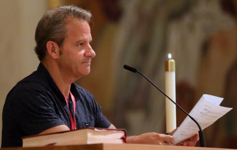 Chaz Muth, multimedia editor for Catholic News Service, gives one of the readings during Mass at St. Mary Cathedral of the Immaculate Conception July 5, 2022, during the Catholic Media Conference in Portland, Oregon. (CNS/Bob Roller)