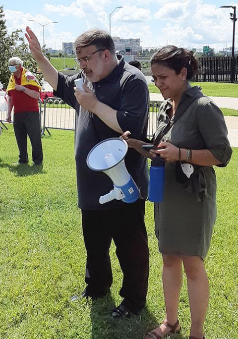 Bishop John Stowe of Lexington, Kentucky, prays over members of Pax Christi USA Aug. 7, 2022, at the Pentagon in Virginia. (CNS/Dennis Sadowski)