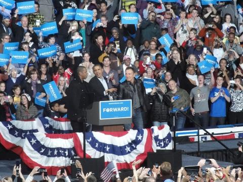 Bruce Springsteen at a 2012 pre-election rally with Barak Obama and rapper Jay-Z. (Paul Becker/Wikimedia Commons)