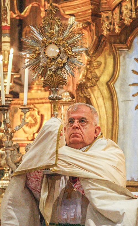 Archbishop J. Augustine Di Noia during a 2010 vespers and benediction service in Rome (CNS/Paul Haring) 