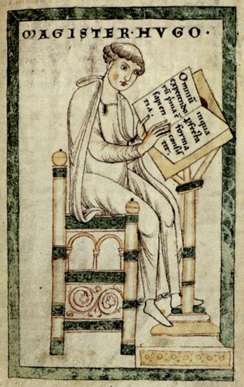 Hugh of St. Victor writes his Didascalicon in a 14th-century miniature. (Wikimedia Commons)