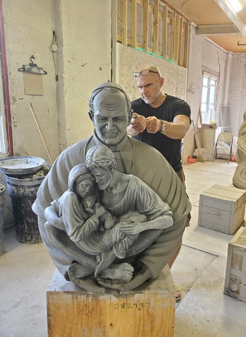 Tim Schmalz works on "Holy Family: the Quiet Moment." (Courtesy of Tim Schmalz)