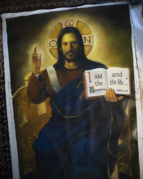 The Greek letters Ο, Ω and Ν are seen in the halo of an icon of Christ "Pantocrator" by Sulpician Fr. Peter Gray. (CNS/Tyler Orsburn)