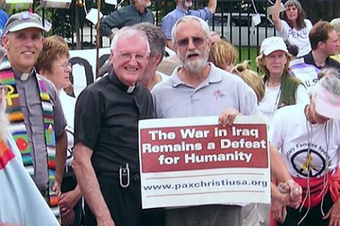 Franciscan Fr. Joe Nangle and Tom Cordaro, a fellow Pax Christi USA Ambassador of Peace*, participate in an anti-war demonstration at the White House in Washington in September 2005. (CNS/Courtesy of Pax Christi USA)