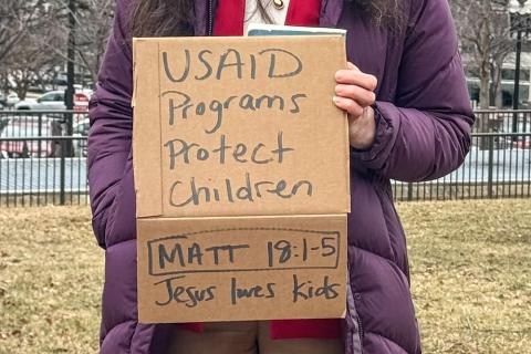 A woman holds a sign supporting the U.S. Agency for International Development, known as USAID at a rally near the U.S. Capitol Feb. 5, 2025. Christians should be concerned with the Trump administration's attempt to dismantle the agency because it is "hurting the cause of caring for the poor and needy" around the world, she said. (NCR photo/Rhina Guidos)