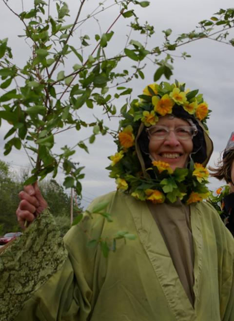 Presentation Sr. Mary Dennis Lenstch wearing an outfit of flowers as part of a peace witness outside the Y-12 Nuclear Weapons Complex near Oak Ridge, Tennessee, in April 2011. (NCR photo/Joshua J. McElwee) 