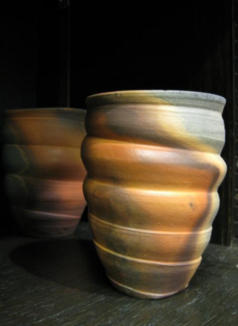 The works of artist in residence and director Richard Bresnahan is displayed on shelves throughout the St. John's Pottery studio in Collegeville, Minnesota. (Zoe Ryan)