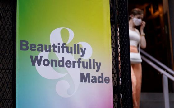 A banner hangs outside St. Francis of Assisi Church in New York City following an annual Pre-Pride Festive Mass June 26. The liturgy, hosted by the parish's LGBT Ministry, is traditionally celebrated on the eve of the city's Pride march.