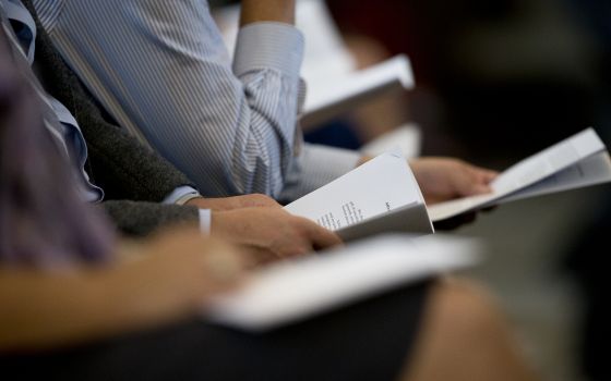 People listen to Catholic scholars release a statement reaffirming Blessed Paul VI's 1968 "Humanae Vitae" encyclical on human sexuality at The Catholic University of America in Washington Sept. 20. (CNS/Tyler Orsburn)