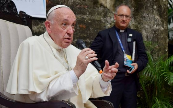 Jesuit Fr. Antonio Spadaro is seen behind Pope Francis during a meeting with Jesuits and laypeople associated with Jesuit institutions in Cartagena, Colombia, Sept. 10. (CNS/Courtesy of La Civiltà Cattolica)