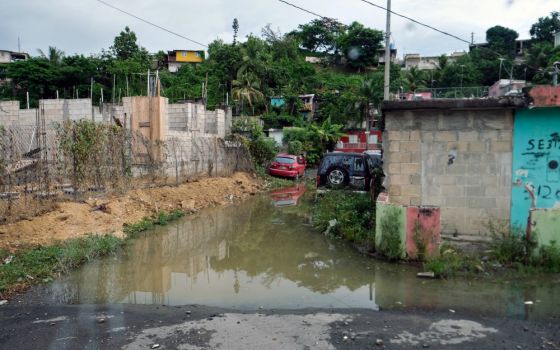 A road flooded by Hurricane Dorian is seen in Canovanas, Puerto Rico, Aug. 28. (CNS/Reuters/Gabriella N. Baez)