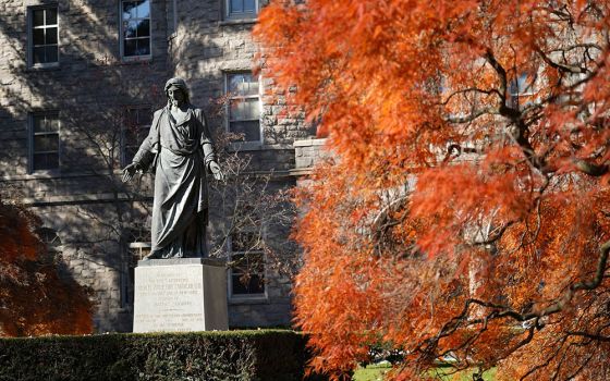 A statue of Jesus is seen amid autumn leaves at St. Joseph's Seminary Nov. 7, 2020, in Yonkers, New York. (CNS/Gregory A. Shemitz)