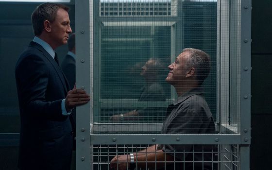 Daniel Craig and Christoph Waltz star in a scene from the movie "No Time to Die." (CNS/MGM/Nicola Dove)