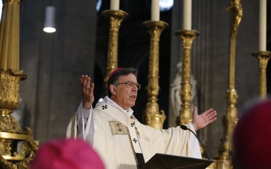 Archbishop Michel Aupetit of Paris celebrates the annual chrism Mass at historic St. Sulpice Church April 17, 2019.