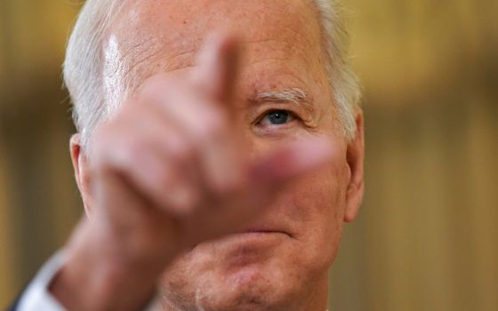 President Joe Biden delivers remarks on the November jobs report from the White House Dec. 3 in Washington. He convoked a two-day virtual summit on promoting democracy Dec 9. (CNS/Reuters/Kevin Lamarque)