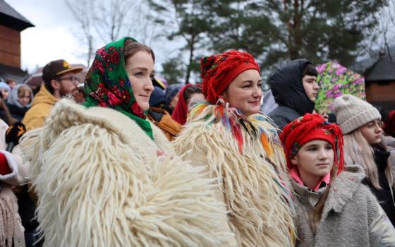 People take part in Christmas celebrations in the Orthodox Church of Ukraine's Church of the Nativity of the Most Holy Theotokos in Kryvorivnya, Ukraine, Dec. 25, 2022. (CNS/Reuters/Yuriy Rylchuk)