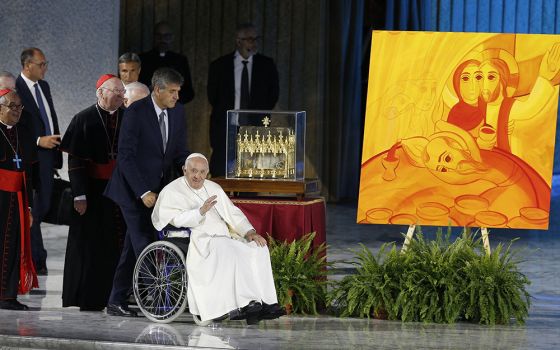 Pope Francis arrives to open the World Meeting of Families in the Paul VI hall June 22 at the Vatican. (CNS/Paul Haring)