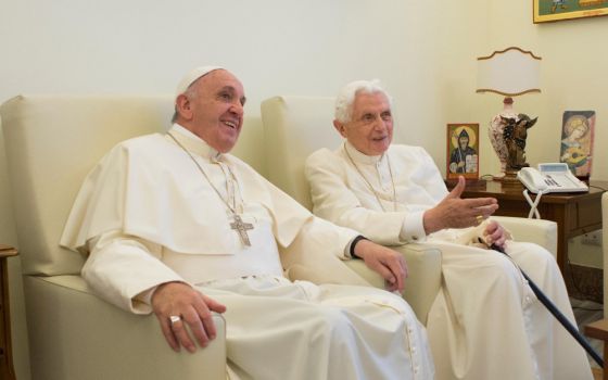 Pope Francis chats with retired Pope Benedict XVI at the retired pope's home in the Mater Ecclesiae monastery at the Vatican June 30, 2015. (CNS/L'Osservatore Romano)