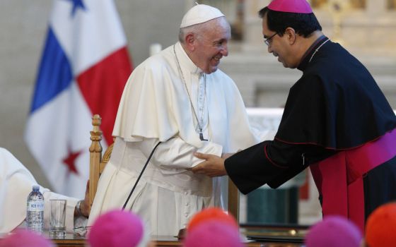 Pope Francis greets Salvadoran Archbishop José Escobar Alas of San Salvador in Panama City Jan. 24, 2019. (CNS photo/Paul Haring)