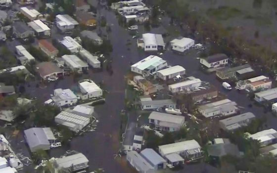 An aerial view shows homes surrounded by floodwaters in Lee County, Fla., Sept. 29, 2022, after Hurricane Ian caused widespread destruction across the Sunshine State. (CNS photo/WPLG TV via ABC via Reuters)