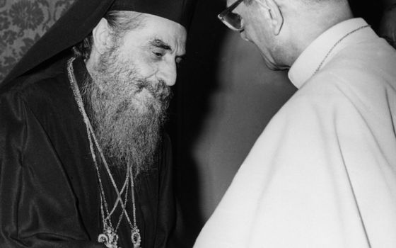 Pope Paul VI greets Orthodox Ecumenical Patriarch Athenagoras of Constantinople during the pontiff's 1964 trip to the Holy Land.