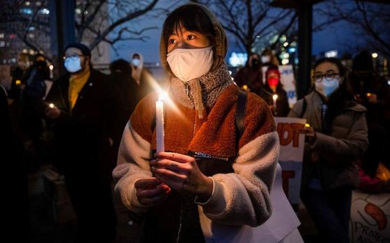 People in Philadelphia attend a vigil in solidarity with the Asian American community in 2021. (CNS/Reuters/Rachel Wisniewski)