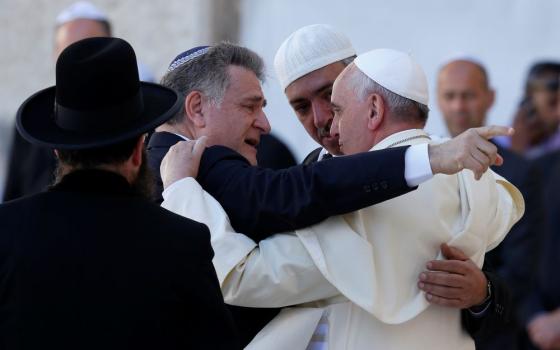 Pope Francis walks with Argentine Rabbi Abraham Skorka after praying at the Western Wall in Jerusalem in this May 26, 2014, file photo. (CNS/Paul Haring)