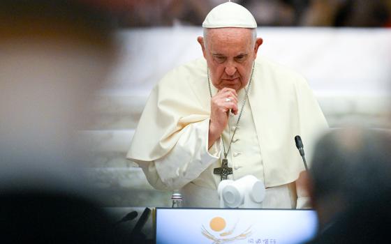 Pope Francis listens during the opening session of the assembly of the Synod of Bishops in the Paul VI Audience Hall at the Vatican Oct. 4. (CNS/Vatican Media)