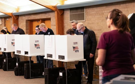 Voters fill out their ballots at a polling station in Columbus Nov. 7 as voters go to the polls in Ohio over Issue 1, a referendum on whether to enshrine expansive legal protections for abortion in the state constitution, which the state's Catholic bishops have vigorously opposed. (OSV News/Reuters/Megan Jelinger)