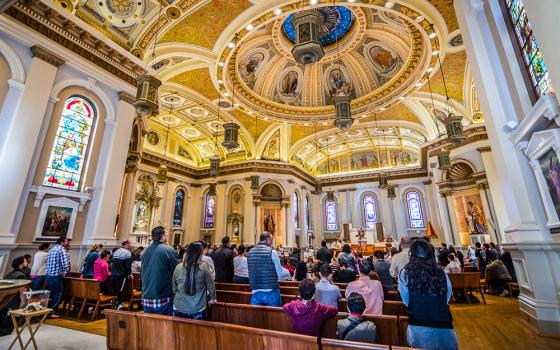 People attend Mass at the Basilica of St. Joseph in San Jose, California, in 2018. According to a new survey, three-quarters of U.S. Catholics view Pope Francis favorably, but that figure is down 8 percentage points from 2021. (Dreamstime/Andreistanescu)