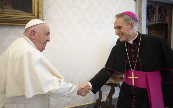 Pope Francis meets Archbishop Georg Gänswein, personal secretary to the late Pope Benedict XVI, in the library of the Apostolic Palace at the Vatican in this May 19, 2023, file photo. Pope Francis has directed Archbishop Gänswein to return to his home diocese of Freiburg in southwest Germany without an assignment by July 1. (CNS photo/Vatican Media)