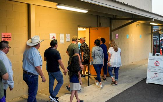 People stand in a line to vote shortly before the polls close in Edinburg, Texas, during the Super Tuesday primary election March 5. (OSV News/Reuters/Cheney Orr)