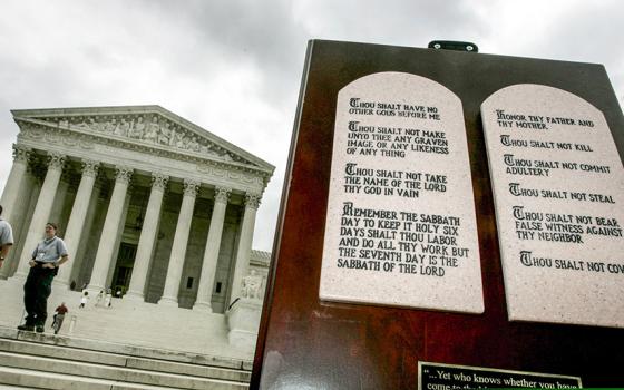 Stone tablets depicting the Ten Commandments are shown outside the Supreme Court in Washington June 27, 2005, placed there during a vigil by a religious group. In Louisiana, public school classrooms will now be required to display the Ten Commandments by the start of 2025 as part of a new educational reform law signed by Gov. Jeff Landry June 19. (OSV News/Reuters/Jason Reed)